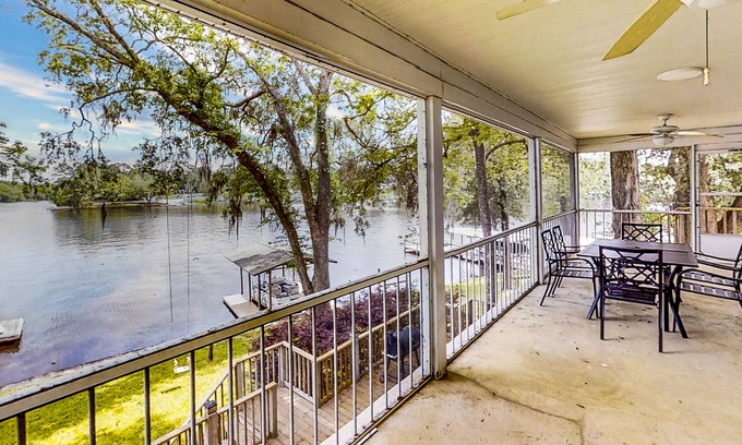 Telogia House | Lakefront stunner with large screened-in porch