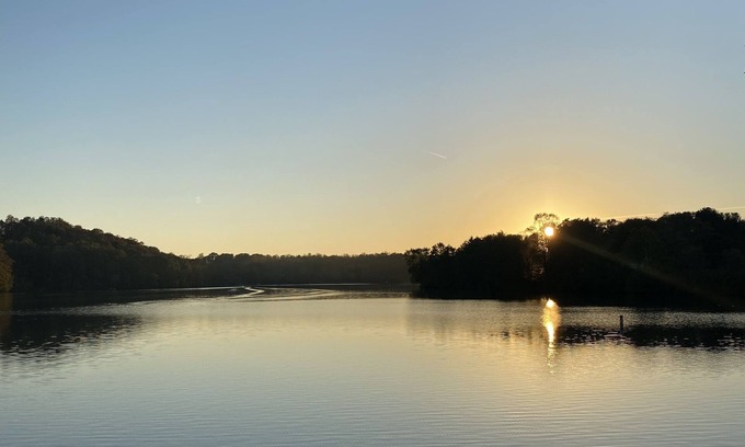 Logan Cabin | Lakeside Hideaway a spacious lodge with a lake view close to local attractions.