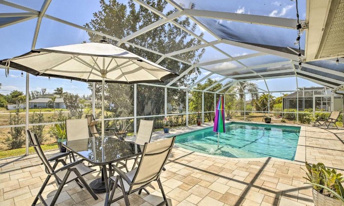Trafalgar House | Lanai and Heated Pool Stunning Cape Coral Getaway