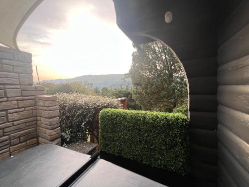 Church Stretton House | LARCHES LODGE Norwegian log cabin, wood stove & spa