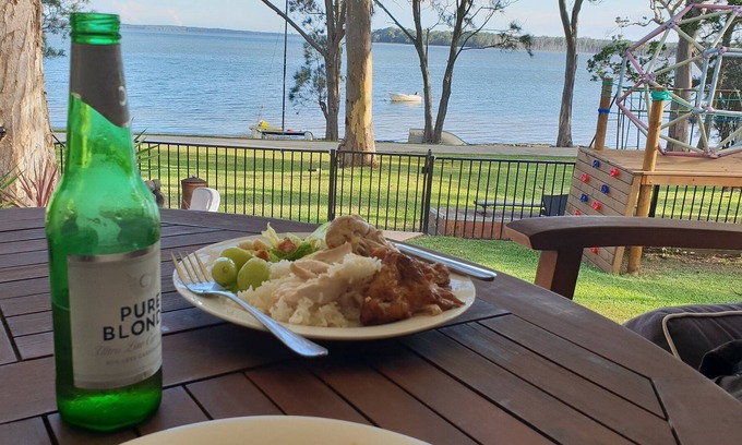 Lake Munmorah House | Large family friendly waterfront property with solar heated magnesium pool