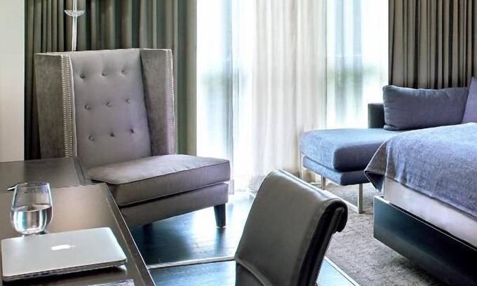 West Plaza Hotel | Lavish Living Kansas Style! Pet-friendly Property, Outdoor Swimming Pool
