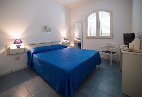 Torre Suda Apartment | Le Bianche ville con patio privato a un passo dal mare