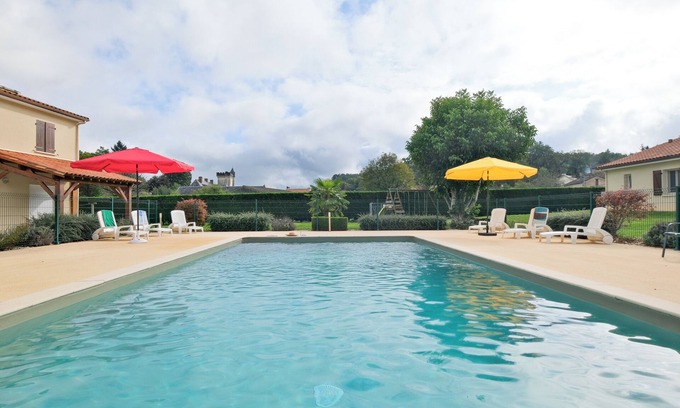 Savignac-les-Eglises House | L’Enclos – House with Air Conditioning and Shared Pool in Savignac-les-Églises