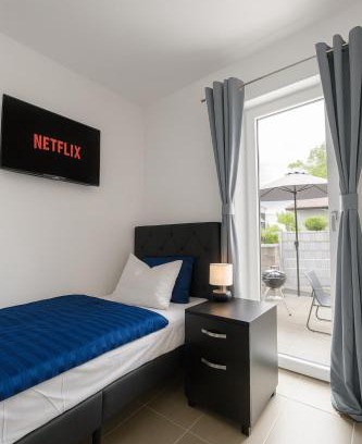 Straubing Apartment | LETA Homes - Komfortables Gästehaus - eigene Parkplätze & Traumterrasse