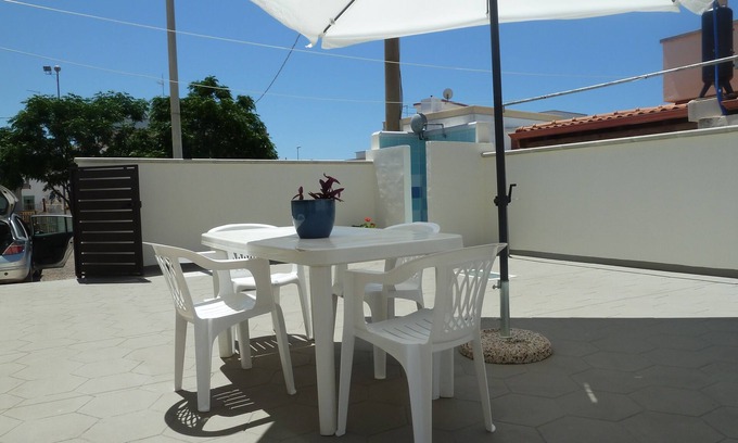 Lido Marini Apartment | LIDO MARINI - LOVELY VACATION HOME WITH LARGE EQUIPPED OUTDOOR COURTYARD