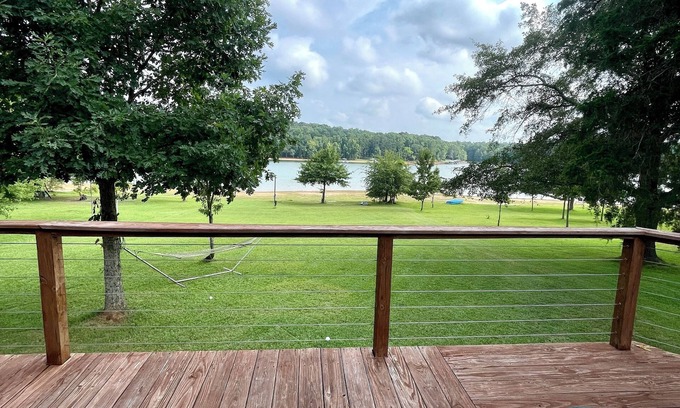Fair Play House | Light & Airy Lakefront Home with Flat Yard, Private Dock, Deck & Screened Porch