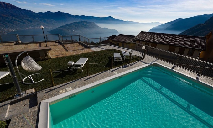 Parzanica Apartment | Lights on the Lake one-bedroom apartment with rooftop terrace and lake view pool