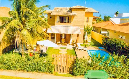 Maceio House | Linda casa de praia com piscina e 5 suítes - Ideal para famílias - Hibiscus - Condomínio beira mar