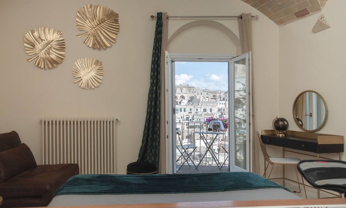 Sasso Caveoso Apartment | Lo Scorcio suite con vista sui Sassi