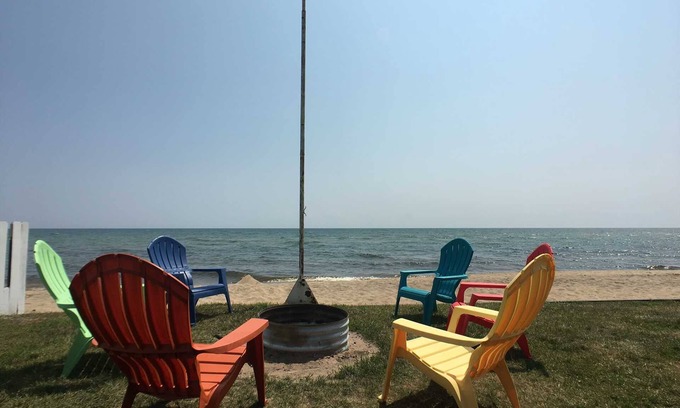 East Tawas House | Located on Lake Huron Sandy Beach! Home sleeps up to 9!