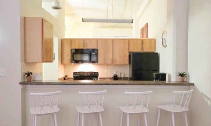 Wholesale District Condo | LOCATION: 2br 2ba Condo in Heart of Downtown Indy