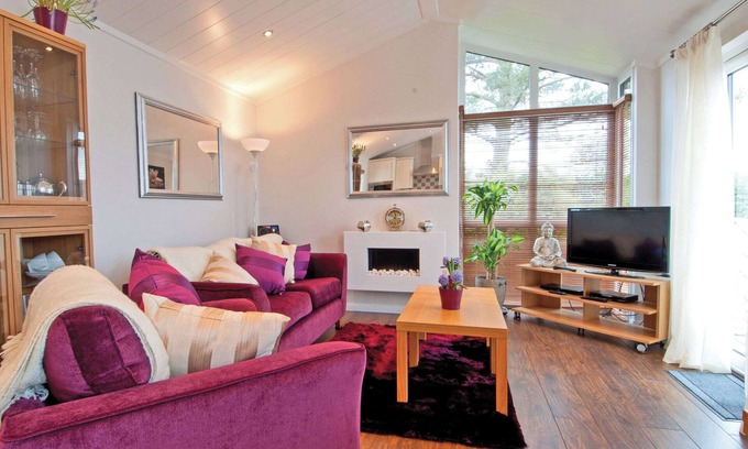 Low Newton Ski Chalet | Lodge with one king-size double with TV.