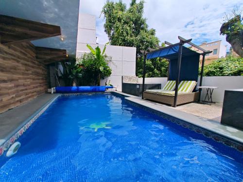Jimenez Apartment | Loft diseño & estilo, alberca climatizada, dos jacuzzis para tu uso personal y exclusivo, terraza y asador de carbon
