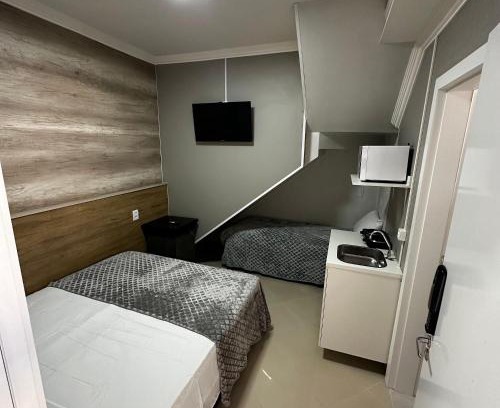 Esplanada Apartment | Loft Lux SM 04 (Smart TV, Ar condicionado, Cozinha)