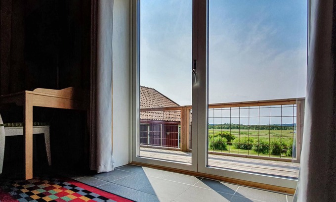 Svanesund Apartment | Look forward to a wonderful view of the Halsöfjord from this vacation home.