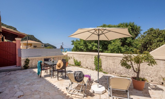 Agios Gordios Cottage | Lovely 2 bedroom cottage just a two minute walk from the beach