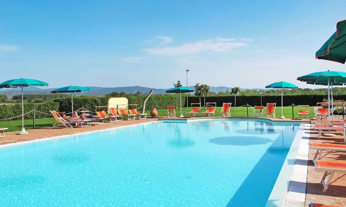 Rigutini Apartment | Lovely apartment for 4 guests with WIFI, pool, A/C, TV, patio and pets allowed