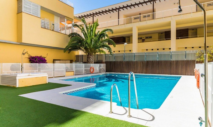 Isla Cristina Apartment | Lovely apartment for 5 guests with pool, WIFI, A/C, TV, balcony and parking