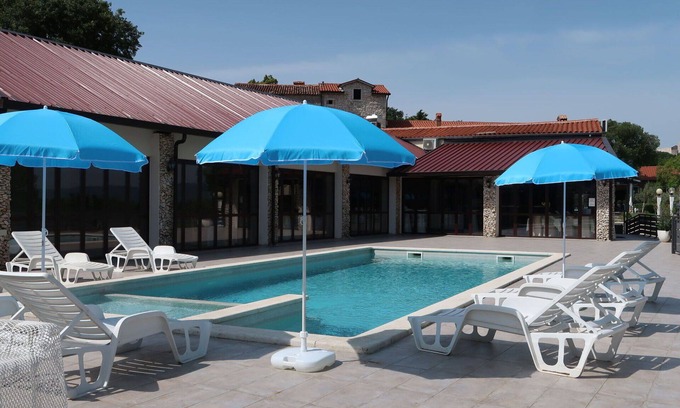 Krsan Villa | Lovely apartment in villa for 6 people with WIFI, pool, A/C, TV, patio, pets allowed and parking