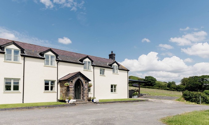 Devils Bridge House | Lovely countryside farm house with large hot tub and disabled friendly. Sleeping 12