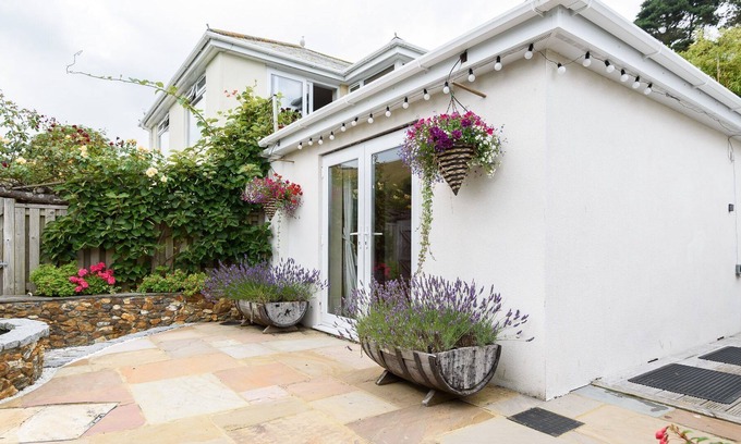 Downderry House | Lovely holiday home with unique and beautifully landscaped paved garden.
