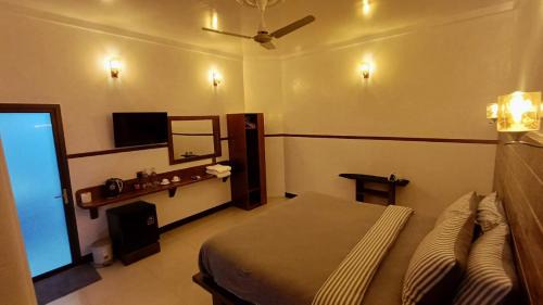 Huraa House | Luk inn at huraa