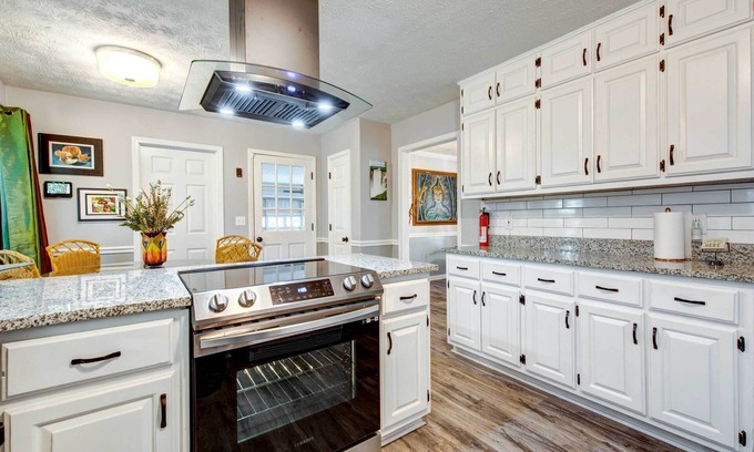 Covington House | Lush Covington Home w/Patio ~ 32 Mi to Atlanta!
