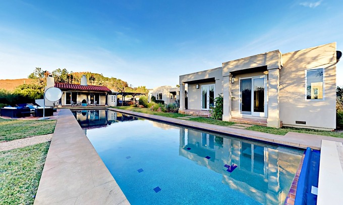 Glen Ellen House | Lush estate amid acres of vineyards, designer decor, gardens, pool & bonus space
