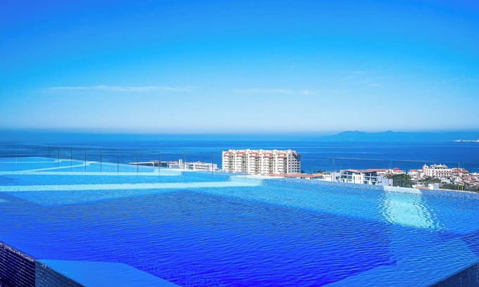 Emiliano Zapata Condo | Luxurious 2800 sq ft 3 bed/3 bath view condo in Puerto Vallarta, gym + parking!