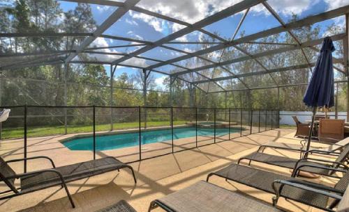 Watersong House | Luxurious 5BR Watersong Resort Villa | Private South-Facing Pool and Spa