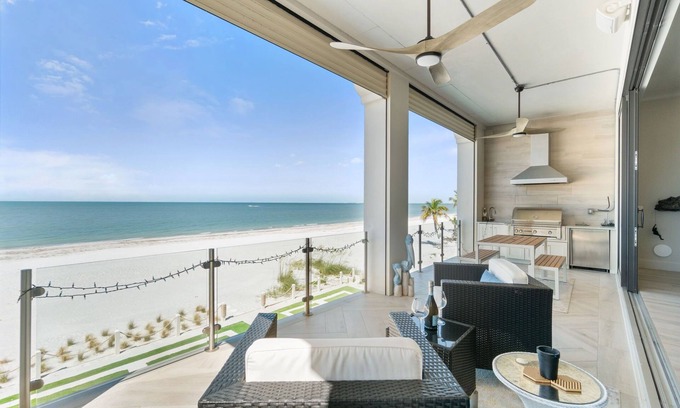 Mid Island Villa | Luxurious Beachfront Vacation Getaway | 4-Bedroom, 4.5-Bath w/Heated Pool & Spa | Sleeps 12