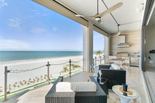Mid Island House | Luxurious Beachfront Vacation Getaway, 4 Bedroom, 4 and half Bath w Heated Pool, Spa, Sleeps 12