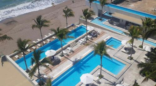 Las Glorias Apartment | Luxury 12th-Floor Condo, Ocean View, Near Malecon