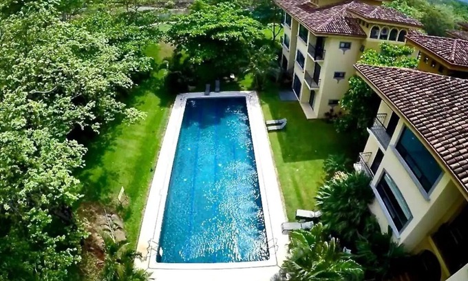 Tamarindo Apartment | Luxury 2BR Retreat Near Tamarindo: Pool View, Modern Comfort, and Prime Location