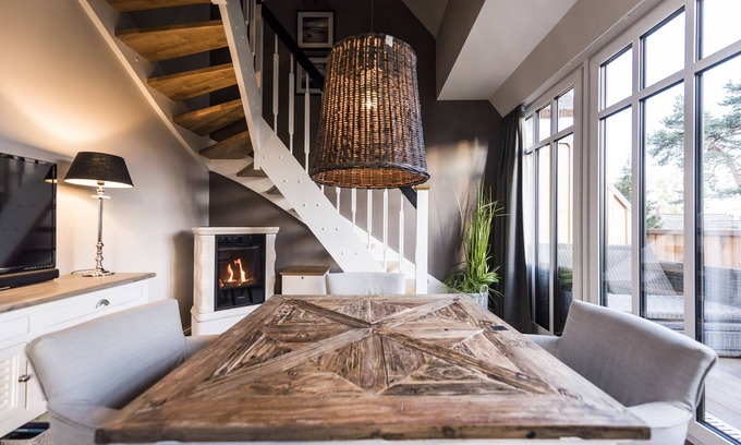 Loddin Resort | Luxury apartments with daily. Cleaning, fireplace, water views, laundry incl.
