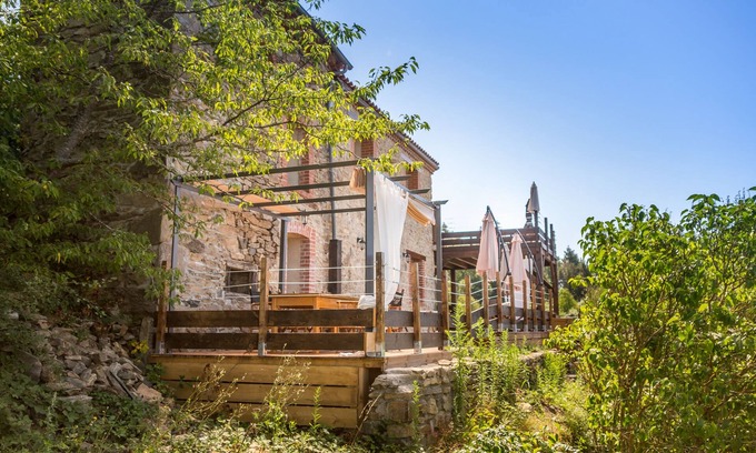 Saint-Prejet-Armandon House | Luxury atypical stone house in a hamlet with view and fireplace