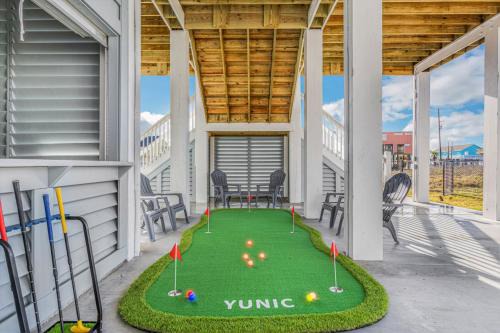 Crystal Beach House | Luxury Beach House Glow in dark golf Game Room