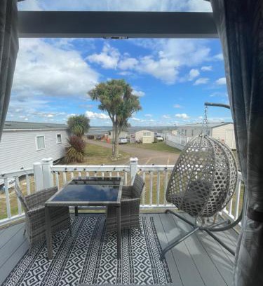 Isle of Grain Apartment | Luxury family Caravan with decking and a sea view at Kent coast sleeps 6
