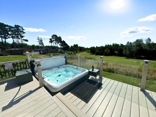 Swarland House | Luxury Hot Tub Lodge, Panoramic Views & Free Golf, Dog Friendly