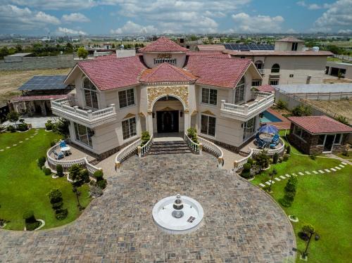 Hassan Abdal House | Luxury Hotel Near Islamabad Airport- BBQ, Pool, Waterfall, Gazebose