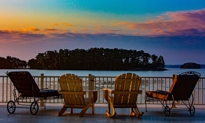 Cumming House | Luxury lake home, private sandy beach, huge covered double dock.
