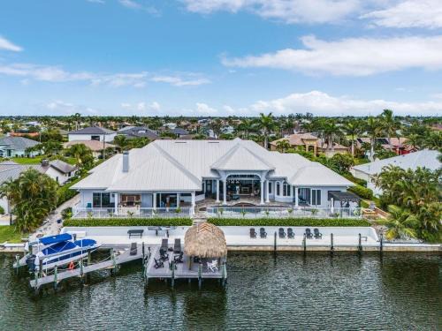 Pelican House | Luxury Resort-Style Saltwater Pool Home in SW Cape Coral