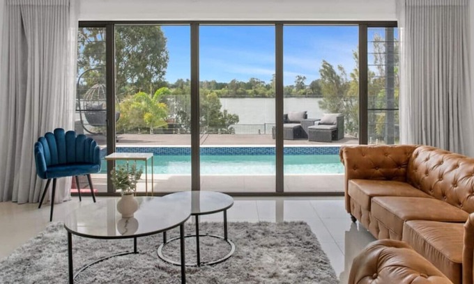 Helensvale House | Luxury Riverfront Holiday Villa Newly Furnished