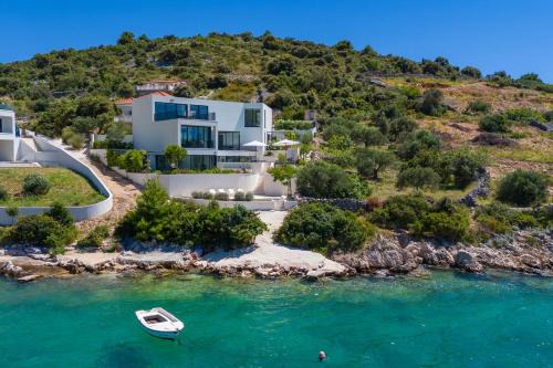 Rogoznica Villa | Luxury Seafront Villa Roots with private, heated pool, 5 en-suite bedrooms, enchanting sea views