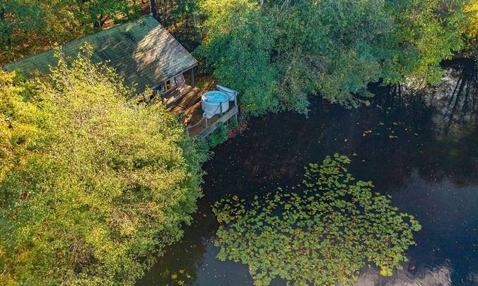 Earls Colne Cabin | Luxury secluded lakeside cabin with hot tub. Pet Friendly!