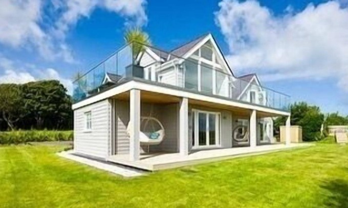 Rhoscolyn House | Luxury stay for 14 guests. Hot tub, tennis court and sea view