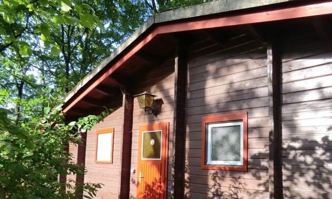 Siemensstadt House | Lying on a peninsula holiday home in Swiss Cottage style