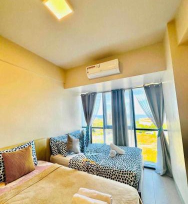 Lapu-Lapu Apartment | MACTAN NEWTOWN FAMILY ROOM Deluxe with free wi-fi, POOL & GYM