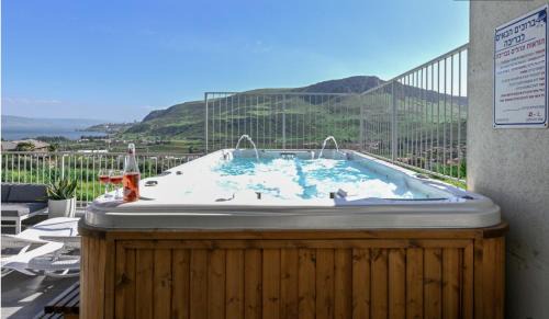 Migdal House | Magdala Infront Sea of Galilee and Mount Harbel